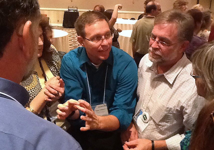 A man wearing a blue shirt.
