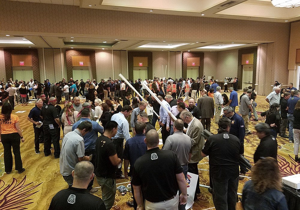 A crowd of people in a room.