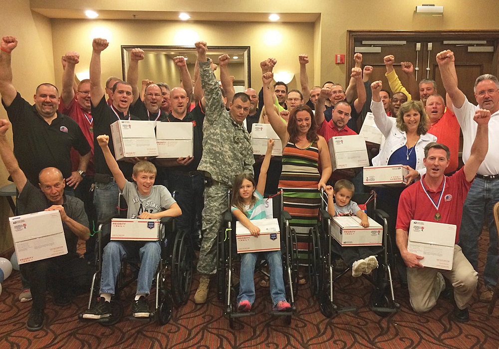 A group of people in wheelchairs posing for a picture.