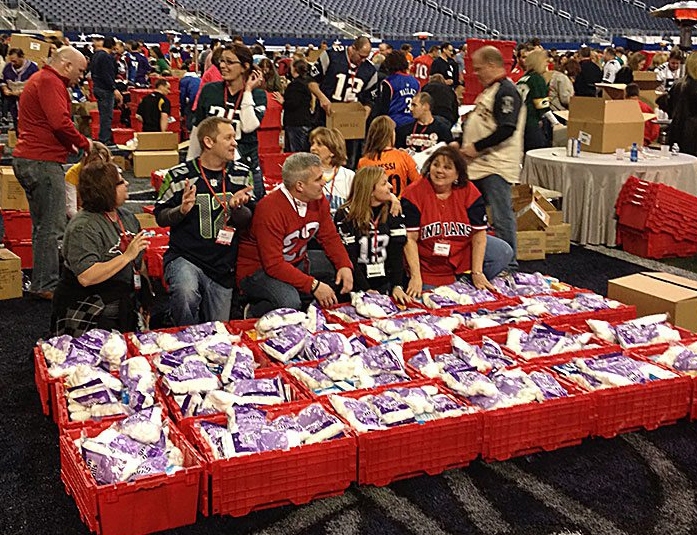 A group of people in a stadium.