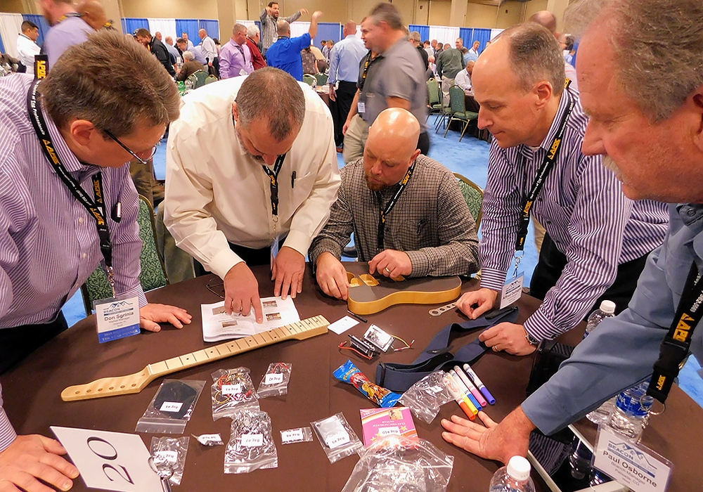 A group of men at a table.