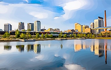 A city skyline reflected in a body of water.