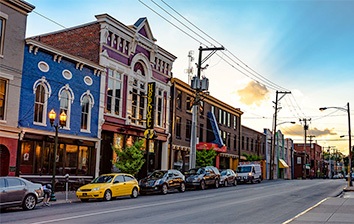 A city street with cars parked on it.