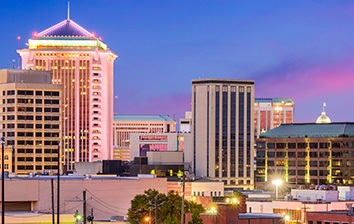 A city skyline at dusk.