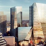 An artist's rendering of a skyscraper in a city.