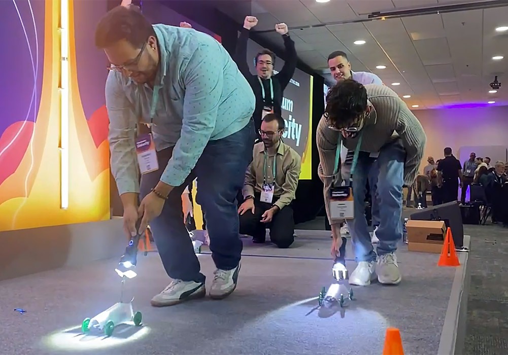 A group of people playing a game on a stage.