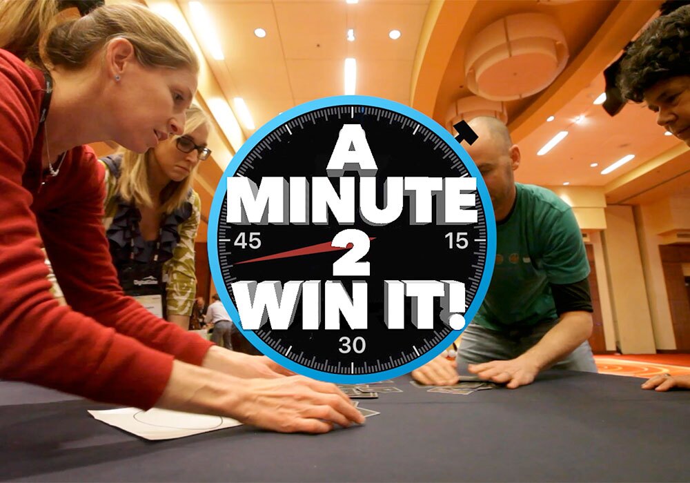 A group of people playing a game of a minute win it.