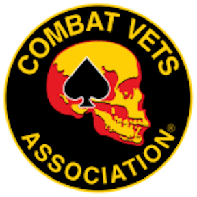 Logo of the Combat Vets Association featuring a yellow and red skull with a black spade shape, encircled by a yellow-bordered black ring with the text "Combat Vets Association.