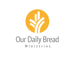 Our Daily Bread Ministries logo featuring stylized wheat design in a yellow circle above the text "Our Daily Bread Ministries.".
