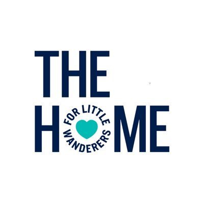 Logo of The Home for Little Wanderers featuring the text "THE HOME FOR LITTLE WANDERERS" with a heart embedded in the word "HOME".