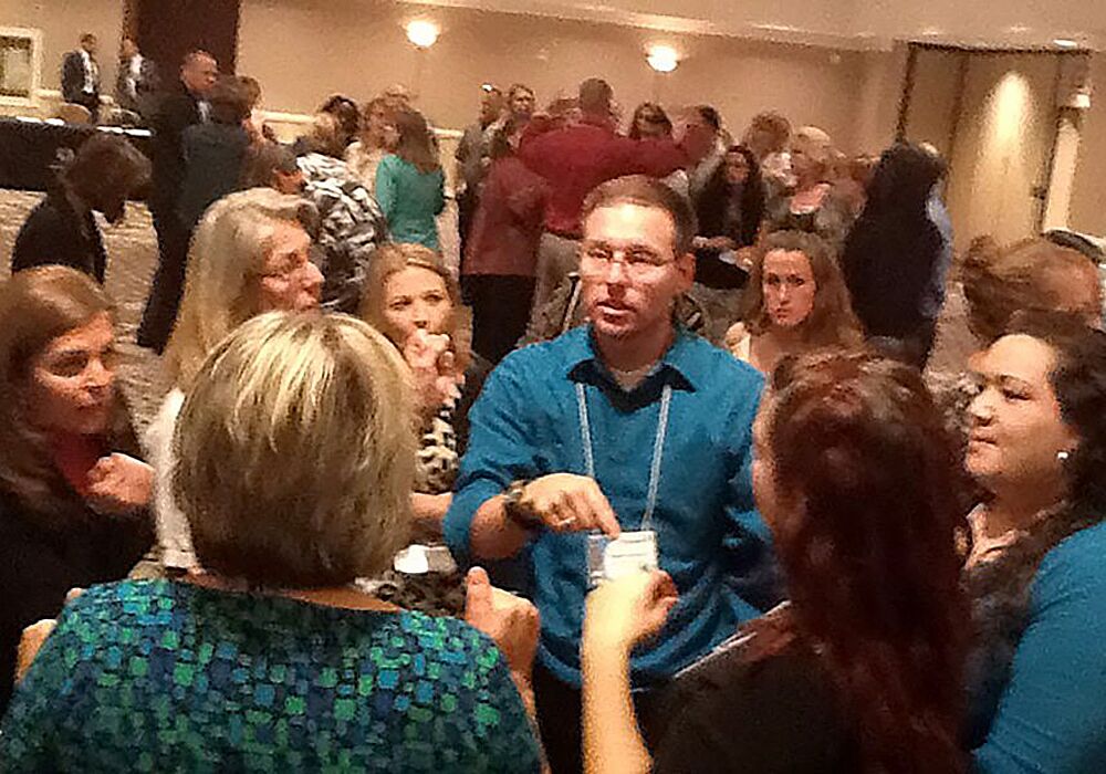 A group of people in a room.