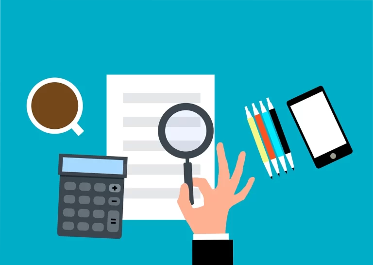A hand holding a calculator, with emphasis on team building program customization through careful examination and analysis.