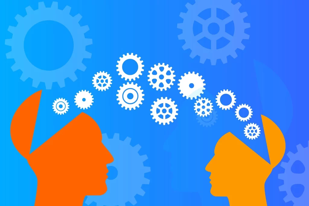 Two people with gears in their heads.