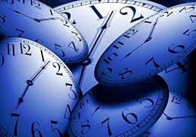 A group of blue clocks on a black background.