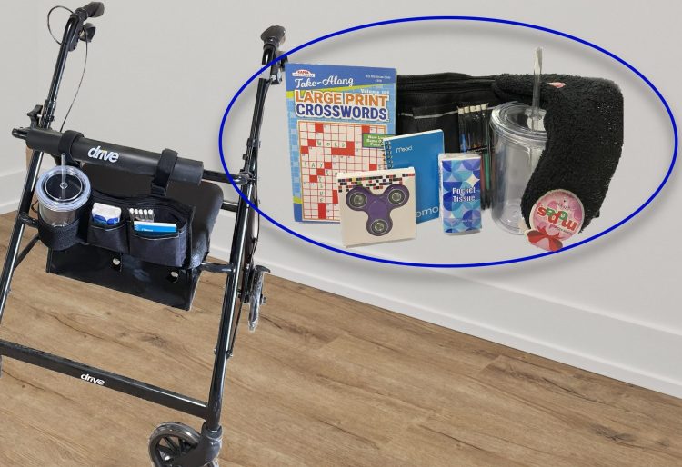 A walker with a bag and other items.