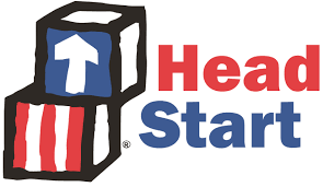 Head Start logo featuring two building blocks, one with a white arrow and the other with red and white stripes, accompanied by the text "Head Start" in red and blue.