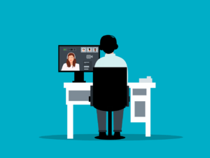 Illustration of a person sitting at a desk having a video call with a woman on a computer screen, against a blue background—perfect for connecting or enjoying virtual games to play on Zoom.