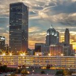 The skyline of oklahoma city at sunset.