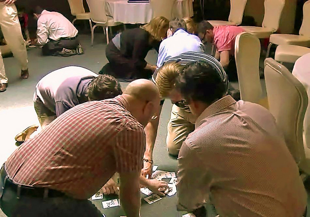 A man wearing a striped shirt.
