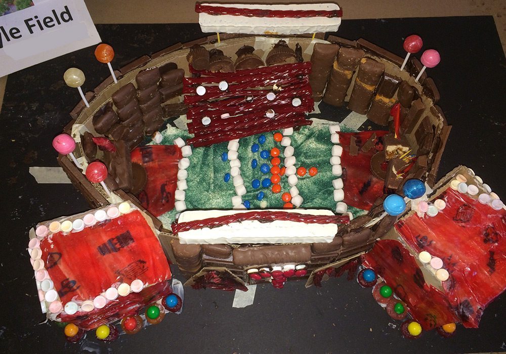 A cake decorated like a football field.