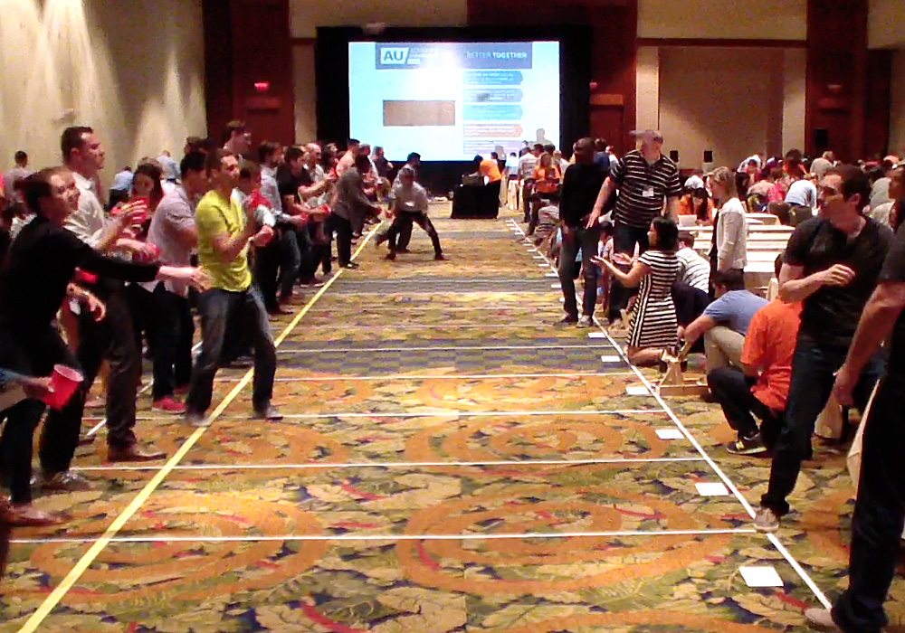 A group of people playing a game of wii.