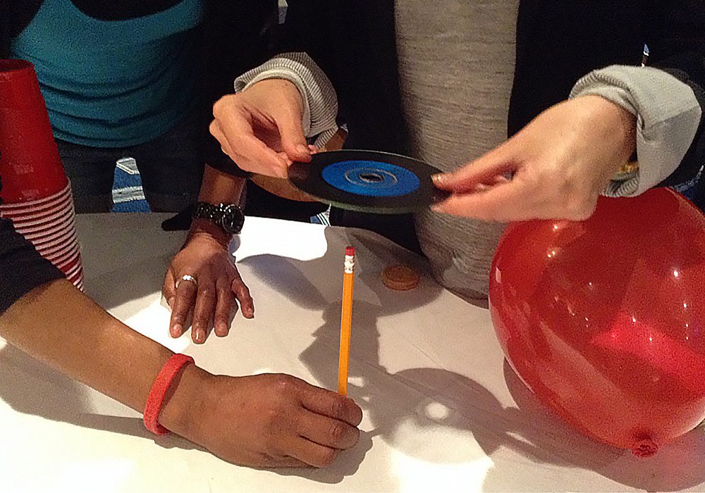 A person holding a pencil.