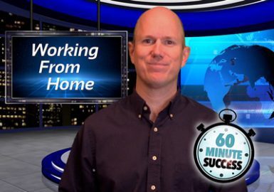 A man standing in front of a news studio.