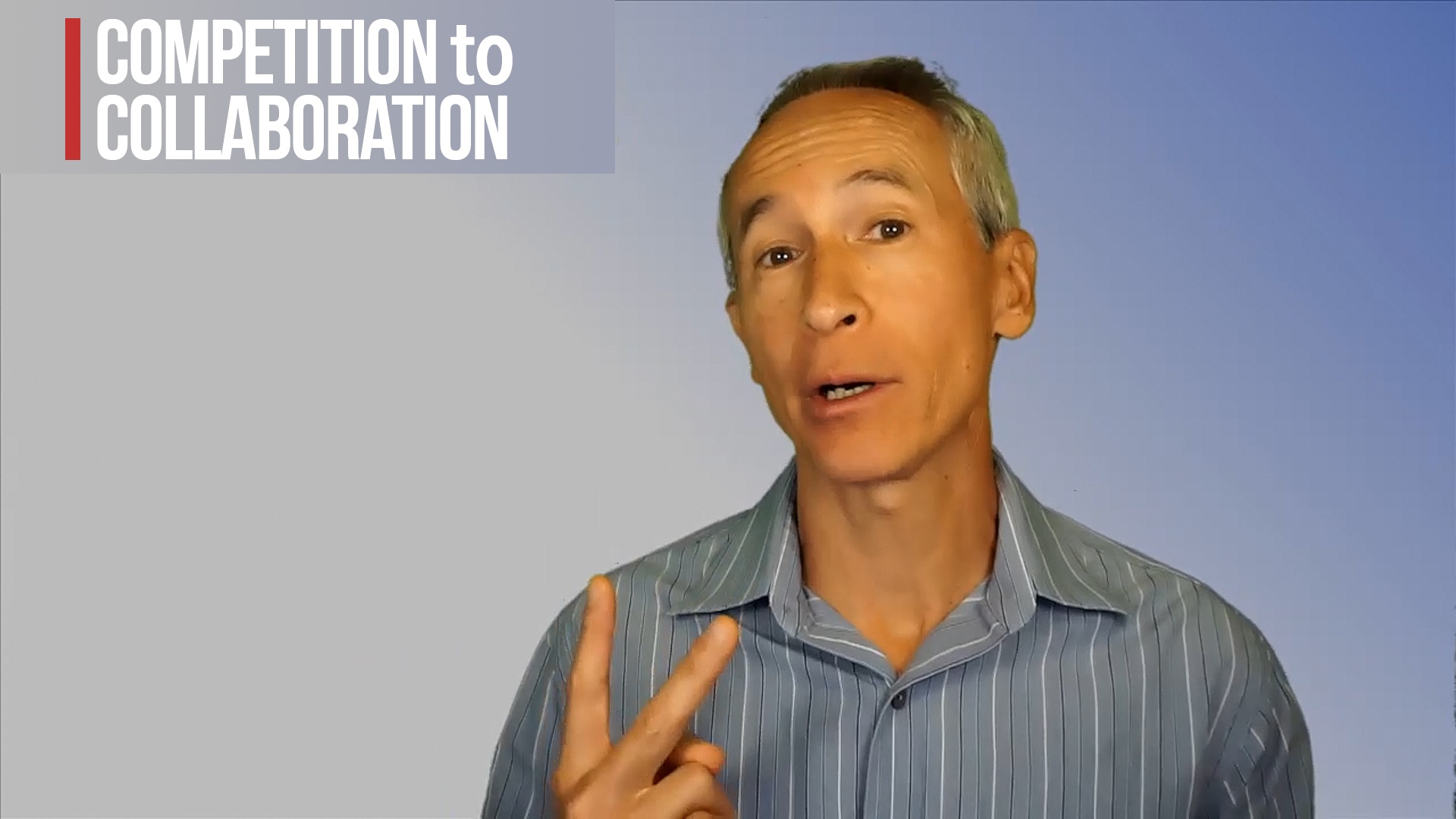A man making a peace sign with the words competition to collaboration.