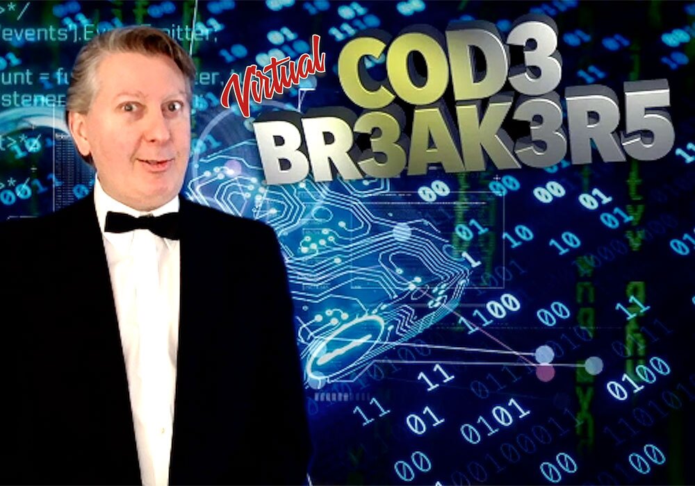 A man in a tuxedo standing in front of a computer screen.