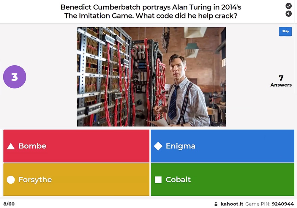 A picture of a man in a computer room.