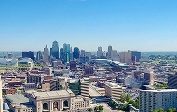 A view of the city from the top of a building.