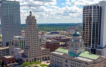 An aerial view of a city with tall buildings.