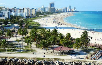 An aerial view of a beach and city.