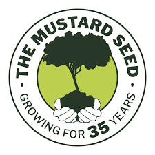 Logo of The Mustard Seed featuring a tree held by two hands within a green circle. Text reads "The Mustard Seed" at the top and "Growing for 35 years" at the bottom.
