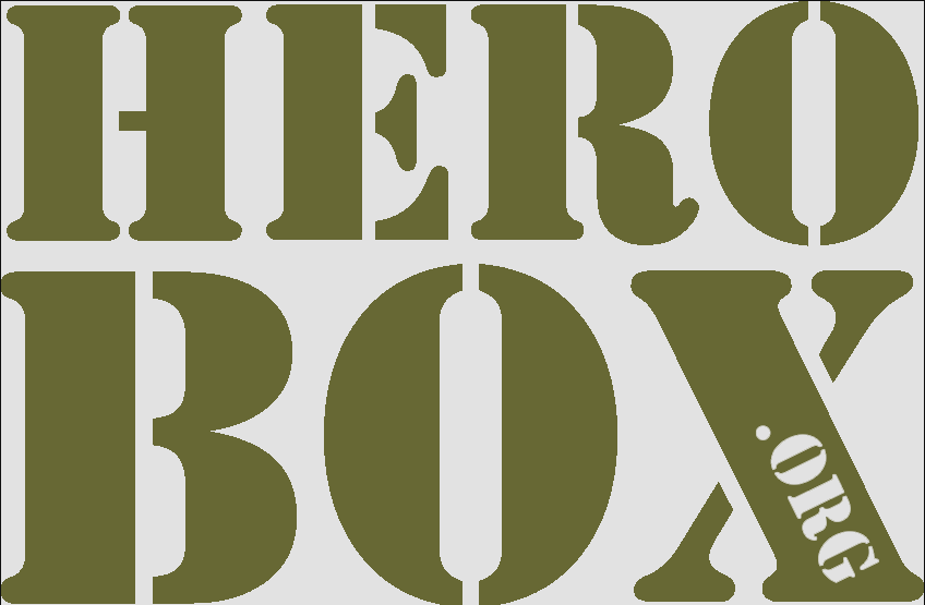 Stencil-style olive green text reads "HERO BOX .ORG" with "ORG" in smaller font, rotated vertically. White background highlights its connection to charitable partners.