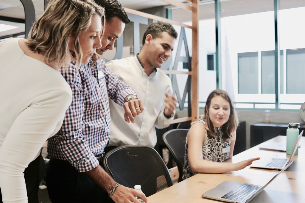 small group of business people meeting and collaborating
