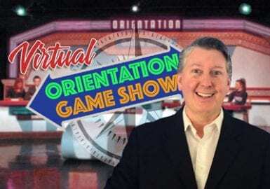 A man in a suit smiling.