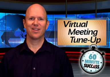 A man standing in front of a digital screen.