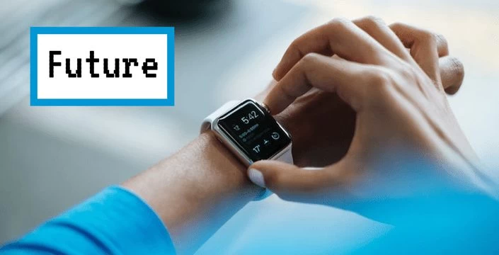 A person's wrist with the word future on it.