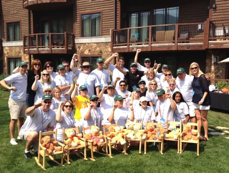 The Phoenix team building participants gather and pose for a photo, capturing the spirit of collaboration and togetherness.