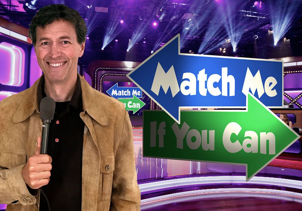 A Host holds a microphone on a brightly lit game show set featuring large arrows with the text "Match Me" and "If You Can.