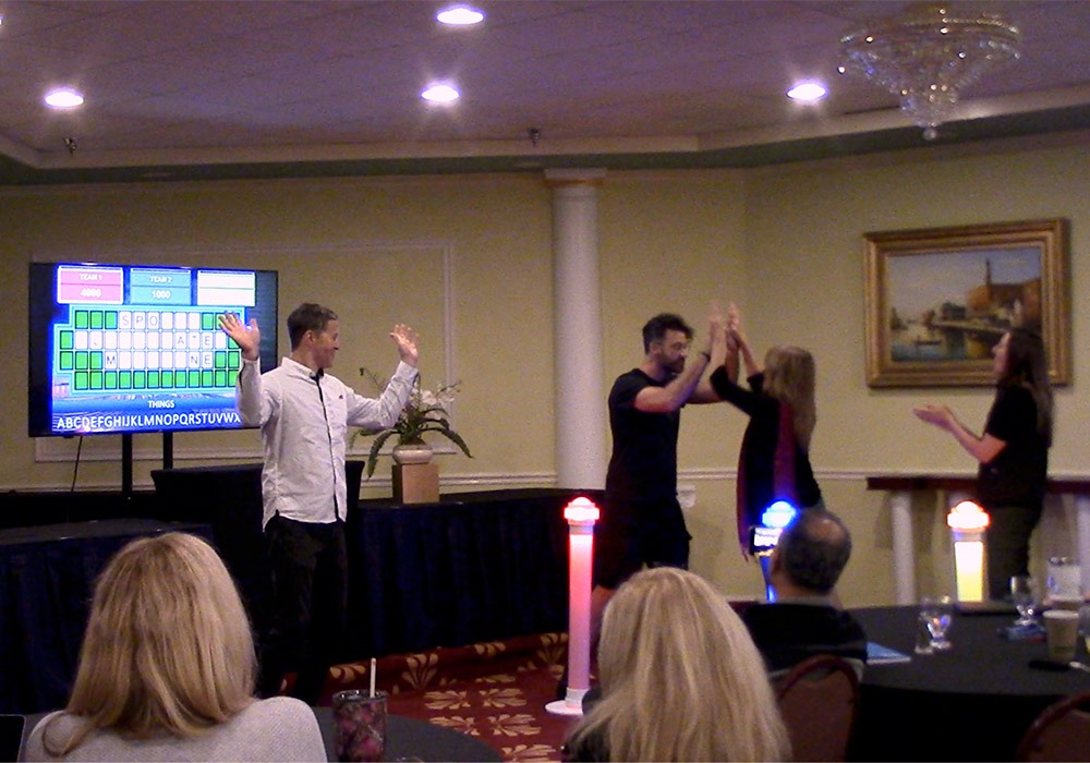 A group of people in a room.