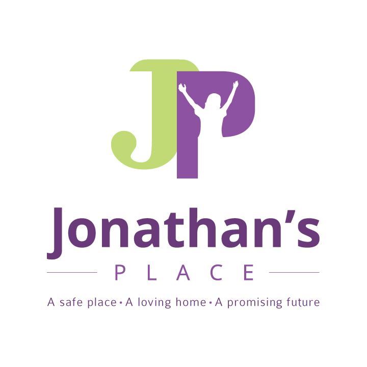 Logo of Jonathan’s Place, featuring a green and purple "JP" with a silhouette of a raised arms figure. Slogan underneath reads, "A safe place • A loving home • A promising future".