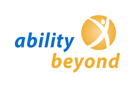 Logo of Ability Beyond featuring the words "ability beyond" in blue and orange with an abstract human figure inside a yellow circular shape.